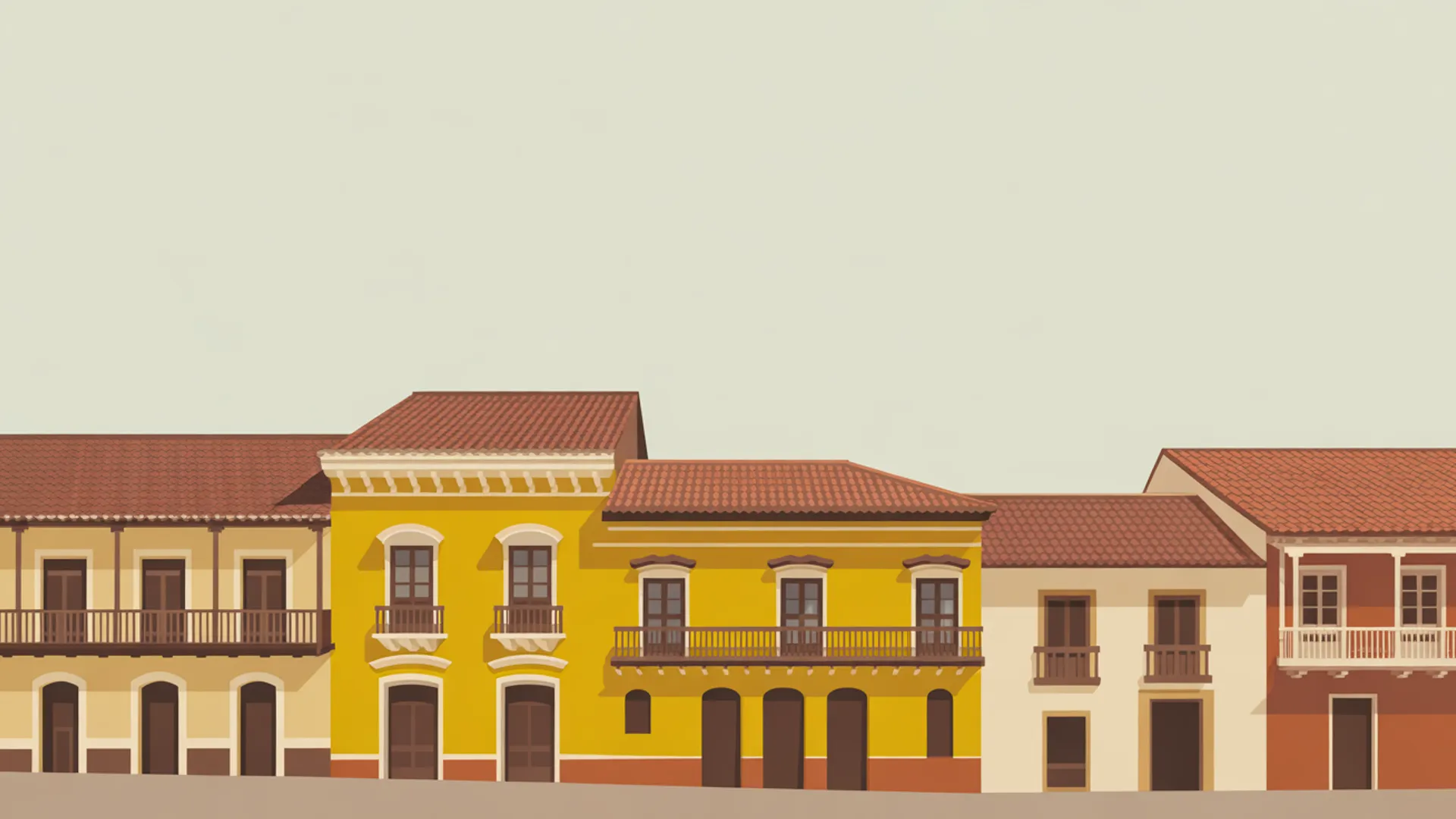 Colombian colonial architecture with colorful balconies and terracotta rooftops